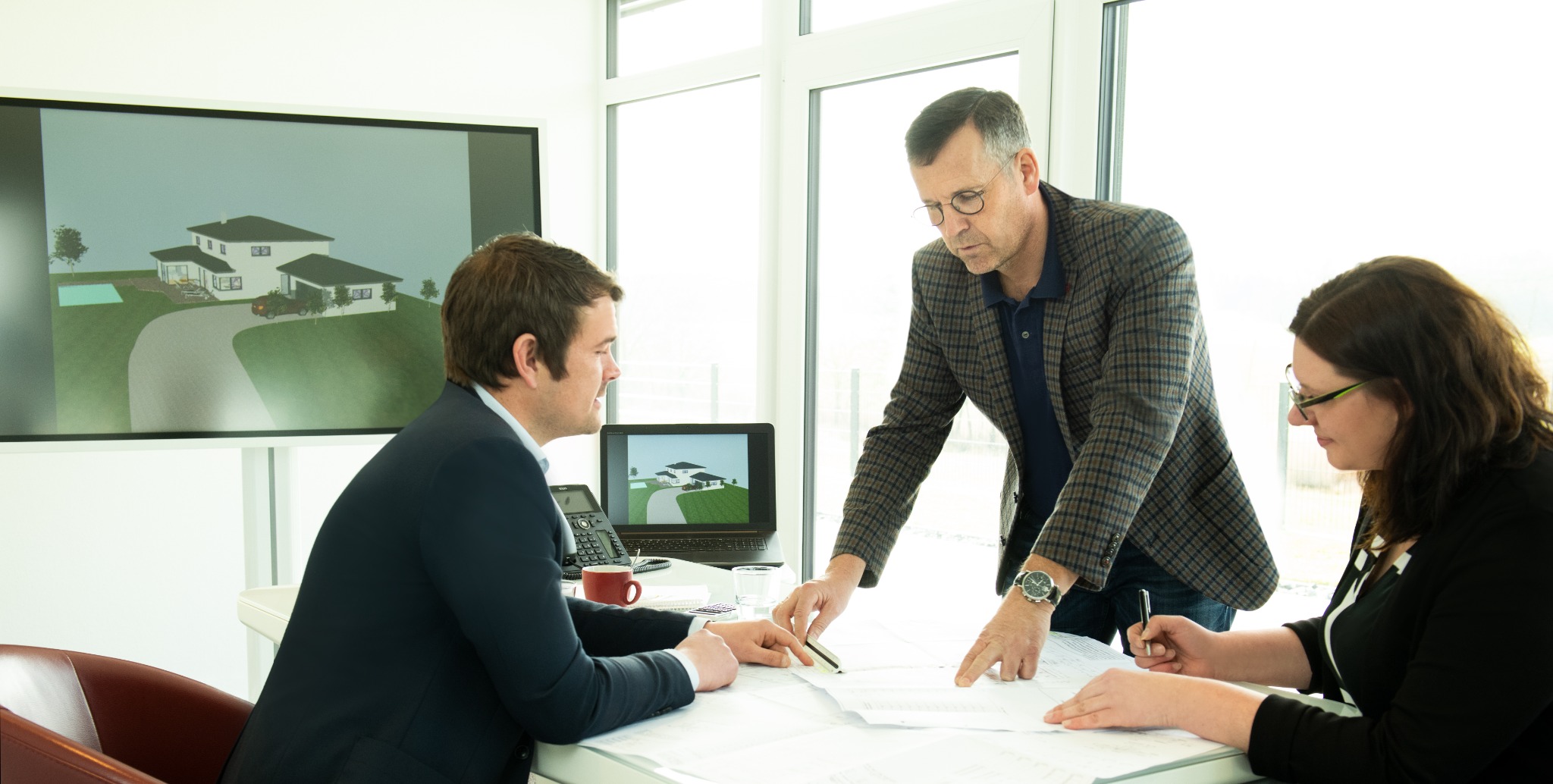 Besprechung mit Bauherren und Planungsteam